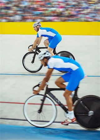simsearch:6113-07588662,k - Track cyclists riding in velodrome Stock Photo - Premium Royalty-Free, Code: 6113-07588701