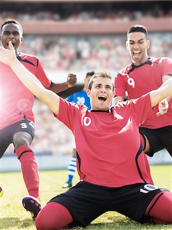 soccer player (male) - Soccer team celebrating on field Stock Photo - Premium Royalty-Free, Code: 6113-07588866