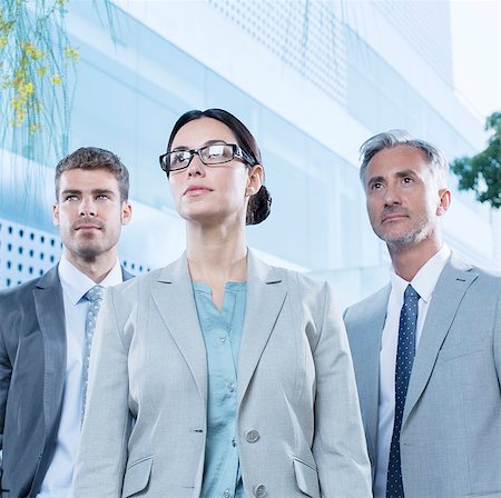 female and thirties and business - Serious business people outdoors Stock Photo - Premium Royalty-Free, Code: 6113-07588974