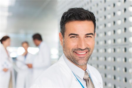 doctor posing - Portrait of confident doctor Stock Photo - Premium Royalty-Free, Code: 6113-07588999