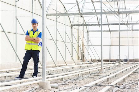 simsearch:6113-07589172,k - Portrait of confident engineer in greenhouse Stock Photo - Premium Royalty-Free, Code: 6113-07589200