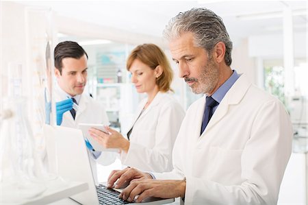 Scientists working in laboratory Stock Photo - Premium Royalty-Free, Code: 6113-07589209