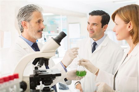 simsearch:6113-07589192,k - Scientists working in laboratory Stock Photo - Premium Royalty-Free, Code: 6113-07589211