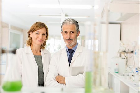 simsearch:6113-07589172,k - Portrait of confident scientists in laboratory Stock Photo - Premium Royalty-Free, Code: 6113-07589225