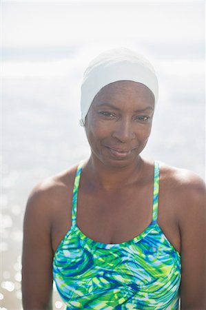 fifty year old women bathing suits - Portrait of serious woman in bathing suit and cap Stock Photo - Premium Royalty-Free, Code: 6113-07589448