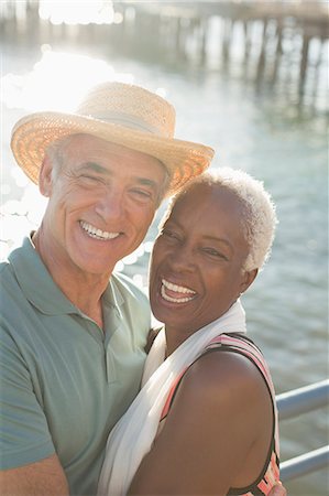 simsearch:6113-07589442,k - Portrait of enthusiastic couple hugging at oceanfront Stock Photo - Premium Royalty-Free, Code: 6113-07589457