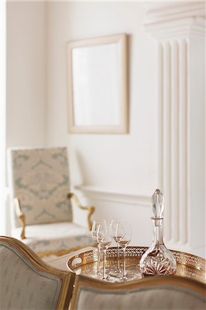 simsearch:6108-06907069,k - Crystal sherry decanter and cordial glasses in luxury living room Stock Photo - Premium Royalty-Free, Code: 6113-07589589