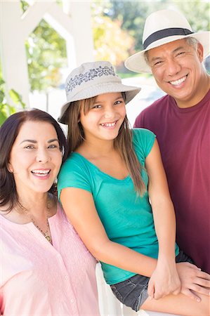 simsearch:6113-07648778,k - Portrait of happy grandparents and granddaughter Stock Photo - Premium Royalty-Free, Code: 6113-07648766