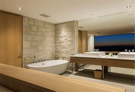 simsearch:6113-07542742,k - Modern bathroom with soaking tub at night Stock Photo - Premium Royalty-Free, Code: 6113-07648976