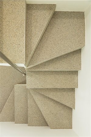 Overhead view of modern spiral staircase Foto de stock - Sin royalties Premium, Código: 6113-07648978