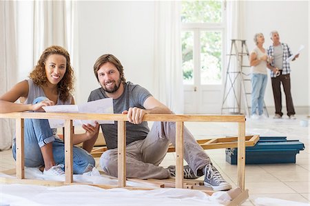 simsearch:6113-07762308,k - Couple building furniture together Stock Photo - Premium Royalty-Free, Code: 6113-07762266