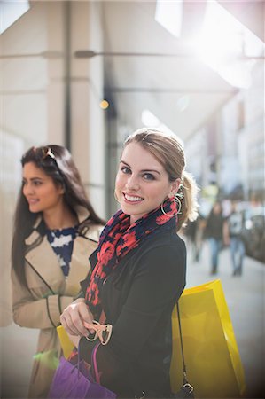 shopping bags city street - Women walking together down city street Stock Photo - Premium Royalty-Free, Code: 6113-07790210
