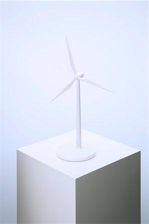 simsearch:6113-07790394,k - Wind turbine model sitting on pedestal Stock Photo - Premium Royalty-Free, Code: 6113-07790397