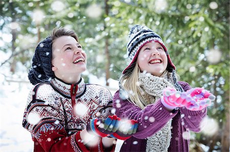 snowflakes  holiday - Siblings catching snow together Stock Photo - Premium Royalty-Free, Code: 6113-07790600