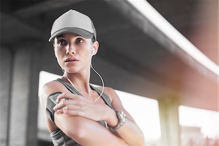 simsearch:6113-07790833,k - Woman playing music before exercising Stock Photo - Premium Royalty-Free, Code: 6113-07790766