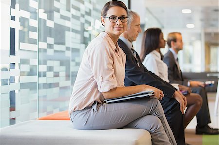 simsearch:6113-07159049,k - Business people sitting in office together Stock Photo - Premium Royalty-Free, Code: 6113-07791308