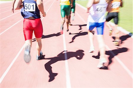 sprinter - Runners racing on track Stock Photo - Premium Royalty-Free, Code: 6113-07730487