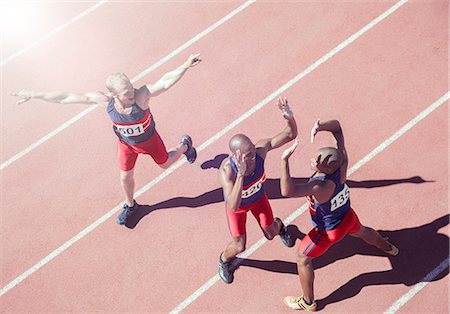 simsearch:6113-07588662,k - Runners cheering on track Stock Photo - Premium Royalty-Free, Code: 6113-07730485
