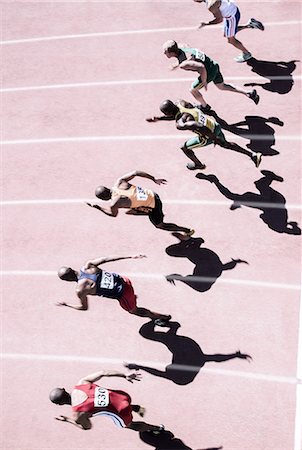 Runners racing on track Stock Photo - Premium Royalty-Free, Code: 6113-07730598