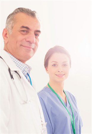 simsearch:6113-07730681,k - Portrait of confident doctor and nurse Stock Photo - Premium Royalty-Free, Code: 6113-07730665