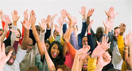 people studio - Portrait of diverse crowd cheering Foto de stock - Sin royalties Premium, Código: 6113-07730721