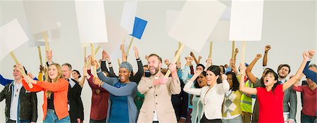 Protesters waving picket signs Foto de stock - Sin royalties Premium, Código: 6113-07730737