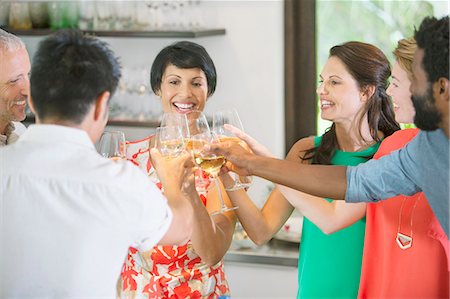 simsearch:6113-06909171,k - Friends toasting each other at party Stock Photo - Premium Royalty-Free, Code: 6113-07730868