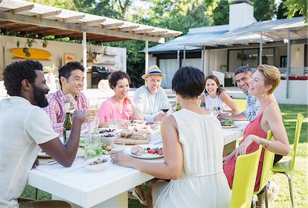 simsearch:6113-07731034,k - Friends talking at dinner party Stock Photo - Premium Royalty-Free, Code: 6113-07730880