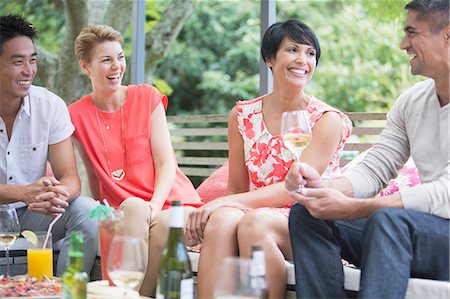 simsearch:6113-07731034,k - Friends relaxing together at party Stock Photo - Premium Royalty-Free, Code: 6113-07730882