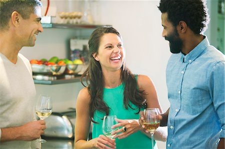 simsearch:6113-07731034,k - Friends talking at party Stock Photo - Premium Royalty-Free, Code: 6113-07730821