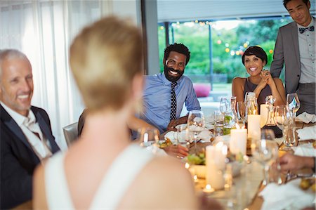 simsearch:6113-07731034,k - Friends talking at dinner party Stock Photo - Premium Royalty-Free, Code: 6113-07730972