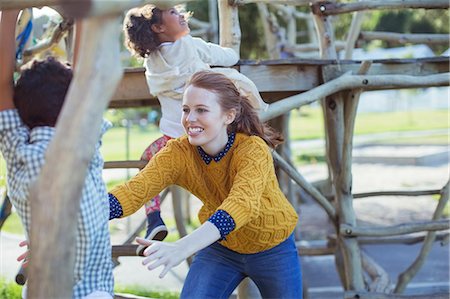 diverse kids enjoying playground - Student and teacher playing outdoors Stock Photo - Premium Royalty-Free, Code: 6113-07731170