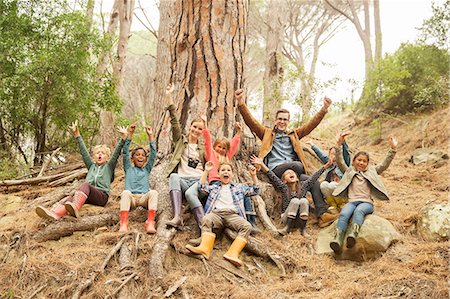 simsearch:6113-07731249,k - Students and teachers cheering in forest Stock Photo - Premium Royalty-Free, Code: 6113-07731203