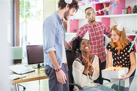 People celebrating birthday in office Stock Photo - Premium Royalty-Free, Code: 6113-07731371