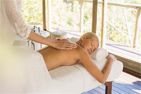 Woman having massage at spa Stock Photo - Premium Royalty-Free, Code: 6113-07731543