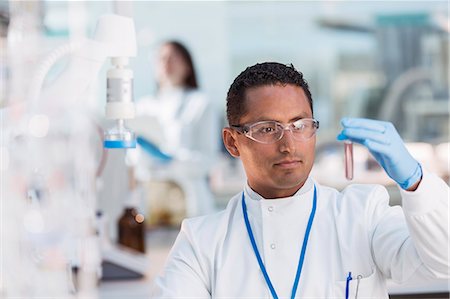 simsearch:6113-07589192,k - Scientist examining test tube in laboratory Stock Photo - Premium Royalty-Free, Code: 6113-07808445