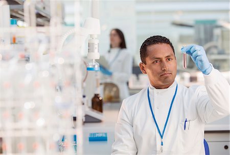 simsearch:6113-07589192,k - Scientist examining sample in test tube in laboratory Stock Photo - Premium Royalty-Free, Code: 6113-07808519