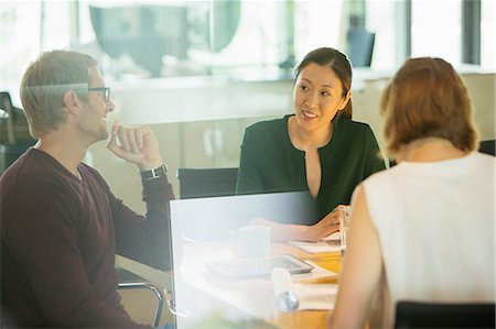simsearch:6113-07565839,k - Business people talking in office meeting Stock Photo - Premium Royalty-Free, Code: 6113-07906260