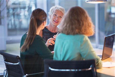 simsearch:614-08030536,k - Businesswomen talking in office meeting Stock Photo - Premium Royalty-Free, Code: 6113-07906291