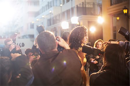 simsearch:6113-08088218,k - Paparazzi photographing celebrity at event Stock Photo - Premium Royalty-Free, Code: 6113-08088157