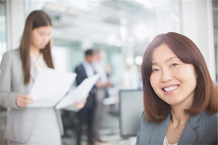 simsearch:6113-08743597,k - Portrait confident businesswoman in office Stock Photo - Premium Royalty-Free, Code: 6113-08220373