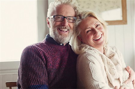 simsearch:6113-07242393,k - Portrait laughing senior couple hugging Stock Photo - Premium Royalty-Free, Code: 6113-08393755