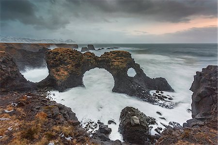 storms - Rock formations among stormy ocean, Amarstapi, Snaefellsnes, Iceland Stock Photo - Premium Royalty-Free, Code: 6113-08321277