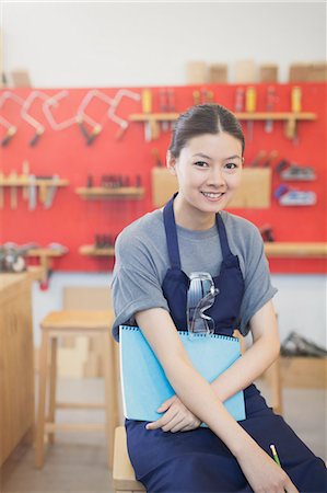 simsearch:6113-08743597,k - Portrait confident female carpenter in workshop Stock Photo - Premium Royalty-Free, Code: 6113-08321404