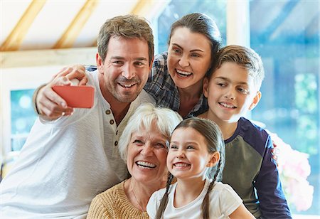 simsearch:400-05918419,k - Multi-generation family taking selfie Stock Photo - Premium Royalty-Free, Code: 6113-08424258