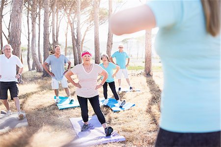 simsearch:693-06018275,k - Senior adults practicing yoga in sunny park Stock Photo - Premium Royalty-Free, Code: 6113-08568715