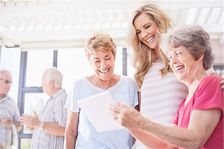 family indoors summer - Senior women using digital tablet Stock Photo - Premium Royalty-Free, Code: 6113-08568724