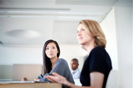 Businesswomen in meeting Stock Photo - Premium Royalty-Free, Code: 6113-08521411