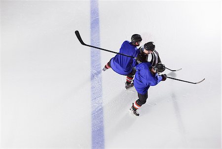 simsearch:6113-08698170,k - Hockey players blocking opponent on ice Stock Photo - Premium Royalty-Free, Code: 6113-08698164