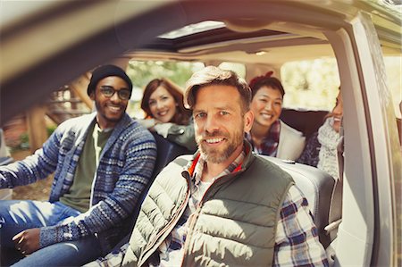 simsearch:6113-08743597,k - Portrait smiling friends inside car Stock Photo - Premium Royalty-Free, Code: 6113-08743392